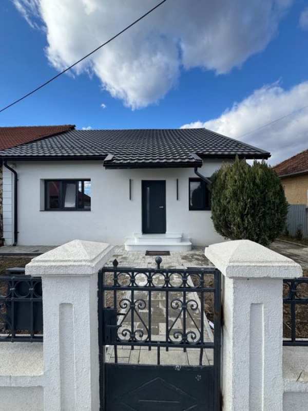 Casa 140 mp si curte cu livada 600 mp aproape de centru