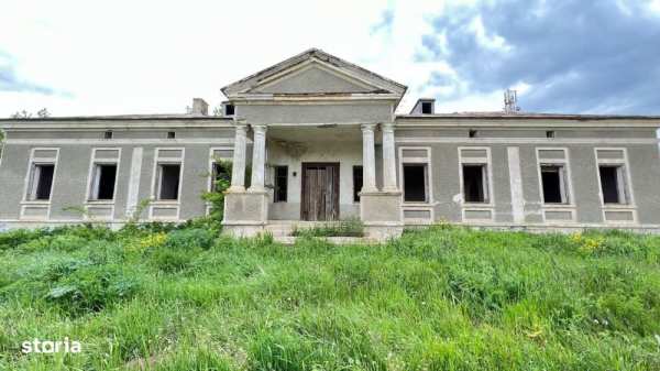 De vanzare conac , teren 1980 mp , 8 camere din caramida , pret 42000