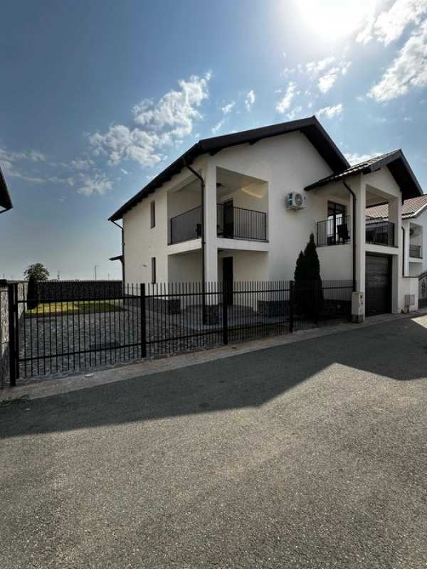 Inchiriere casa cu garaj si curte, finisaje Premium, utilata complet