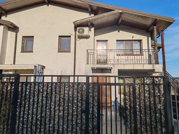 Apartament cu curte proprie în Șorogari-liniște și priveliște spre lac