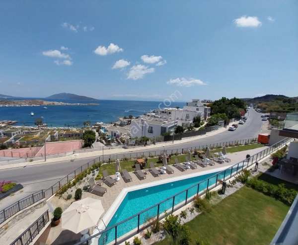 Sezonluk kiralık full deniz manzaralı teraslı 1+1 residences daire