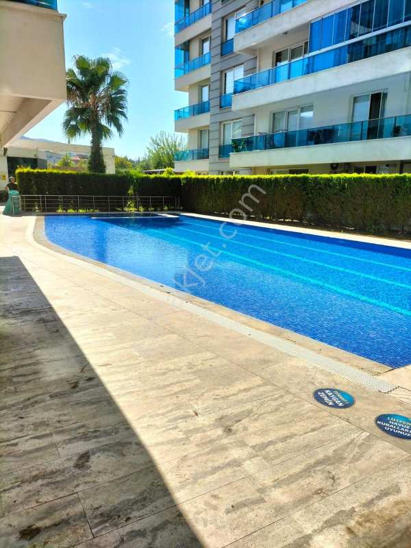 ????güzelyurt mahallesi̇  3+1 140.m2 11katlinin 2 kati si̇te i̇çeri̇si̇nde havuzlu otoparkli